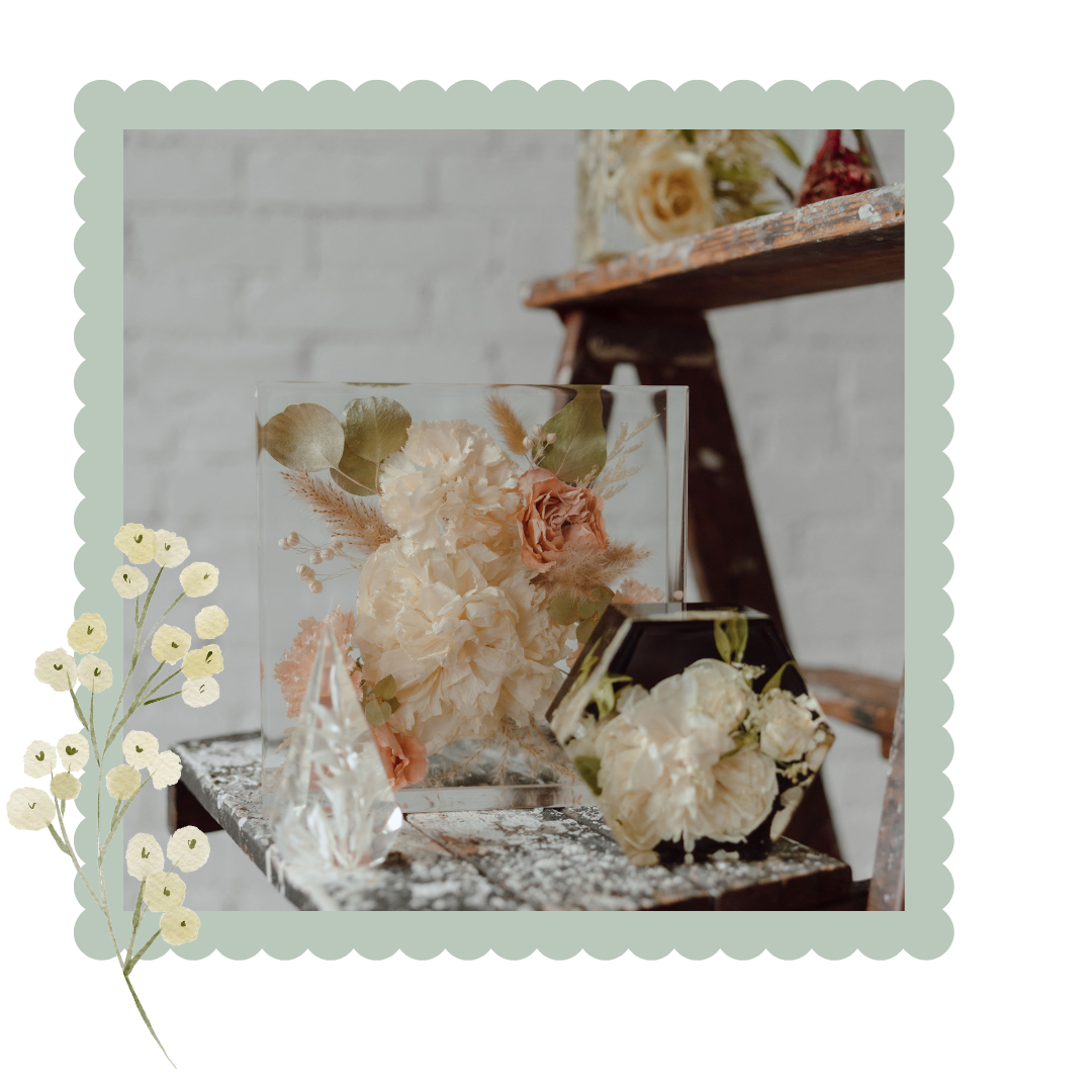 Decorative floral arrangement in resin e on a textured surface with a blurred background